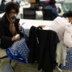 alumni looking at give aways