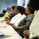 alumni attendees participating during presentation