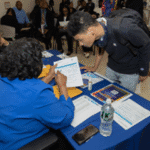 job fair participant receiving information