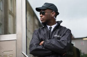 Picture of man in security uniform.